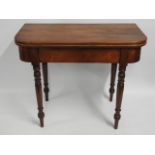 A 19thC. mahogany tea table, 39in wide open x 38.2