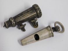 A cased police whistle