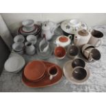 A quantity of Poole pottery tea wares