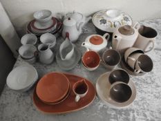 A quantity of Poole pottery tea wares