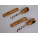 A pair of antique walnut corkscrews. 4.5in long