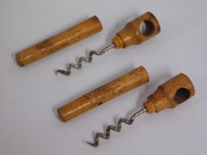 A pair of antique walnut corkscrews. 4.5in long