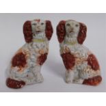 A small pair of 19thC. spaniels, 3in tall