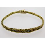 A 9ct three toned gold bracelet, 7in long, 9.7g