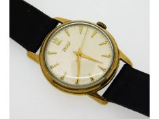 A gents Tissot 9ct gold wristwatch, 30mm case, run