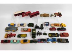 A quantity of diecast toy vehicles including Dinky