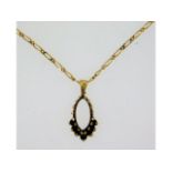 A 9ct gold pendant set with sapphire & 19in long,