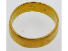 A yellow metal ring, tests electronically as 18ct