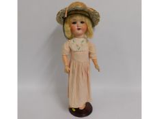 An antique Armand Marseille porcelain headed doll,