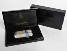 A Yves Saint Laurent lighter & box