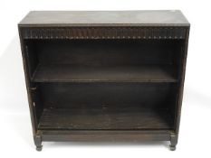 An oak bookcase, 34.5in wide x 11.25in deep x 32in