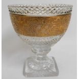 A footed cut glass lead crystal bowl with gilded d
