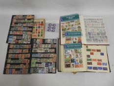 A selection of various stamp albums including some