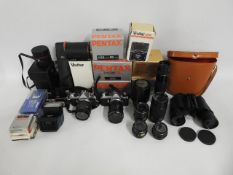 A quantity of cameras & accessories including Pent