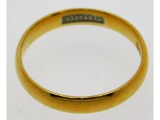 A 22ct gold wedding band, impressed FIDELITY inside, 3.1g, size O/P