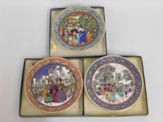 Three Royal Worcester Christmas plates with boxes,