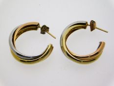 A pair of three colour metal earrings, test as 14c