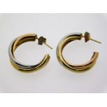 A pair of three colour metal earrings, test as 14c