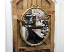 A 19thC. gilt mirror, 35.5in high x 25.5in wide