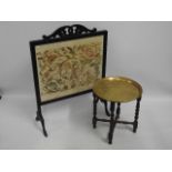 A large antique needlepoint fire screen twinned wi