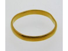 A 22ct gold band, a/f, 2.1g size M