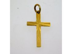 A 9ct gold cross, 20mm high, 0.5g