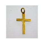 A 9ct gold cross, 20mm high, 0.5g