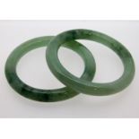 A pair of Chinese jade bangles, internal diameter