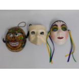 Three masks, one Cuban & two Venetian