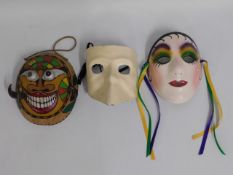 Three masks, one Cuban & two Venetian