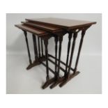 A mahogany nest of three tables, largest 20.5in hi