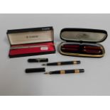 A cased Parker fountain pen, two Le Plume pens wit