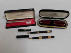 A cased Parker fountain pen, two Le Plume pens wit