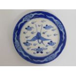 A Chinese porcelain plate with crane decor, Kangxi