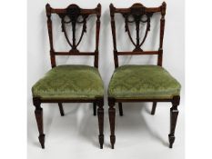 Six decorative upholstered carved dining chairs