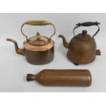 A Georgian copper kettle twinned with two later co