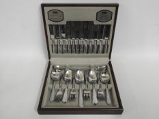 A 44 piece stainless steel Viners canteen of cutle