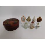 Seven Oriental snuff bottles twinned with an antiq