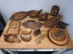 A collection of mixed carved wooden craft items