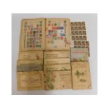 A album of stamps & a quantity of cigarette card a