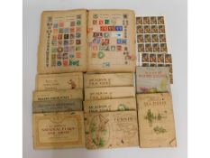 A album of stamps & a quantity of cigarette card a