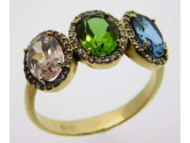 A 14ct gold ring set with diamond, topaz & peridot