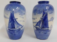 A pair of early 20thC. hand decorated sail boat va