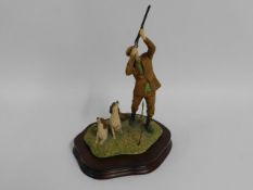 A Border Fine Arts figurine of gun man & dogs, 10.