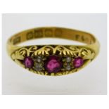 An 18ct gold antique ring set with diamond & ruby
