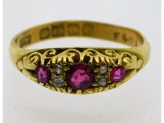 An 18ct gold antique ring set with diamond & ruby