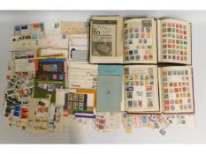 Four mixed world stamp albums, numerous stamps on