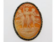 A white metal & marcasite mounted cameo of three g