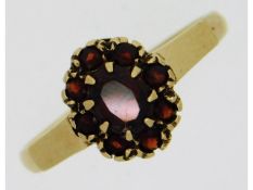 A 9ct gold ring set with garnet, 2.4g, size O