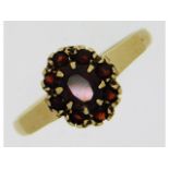 A 9ct gold ring set with garnet, 2.4g, size O